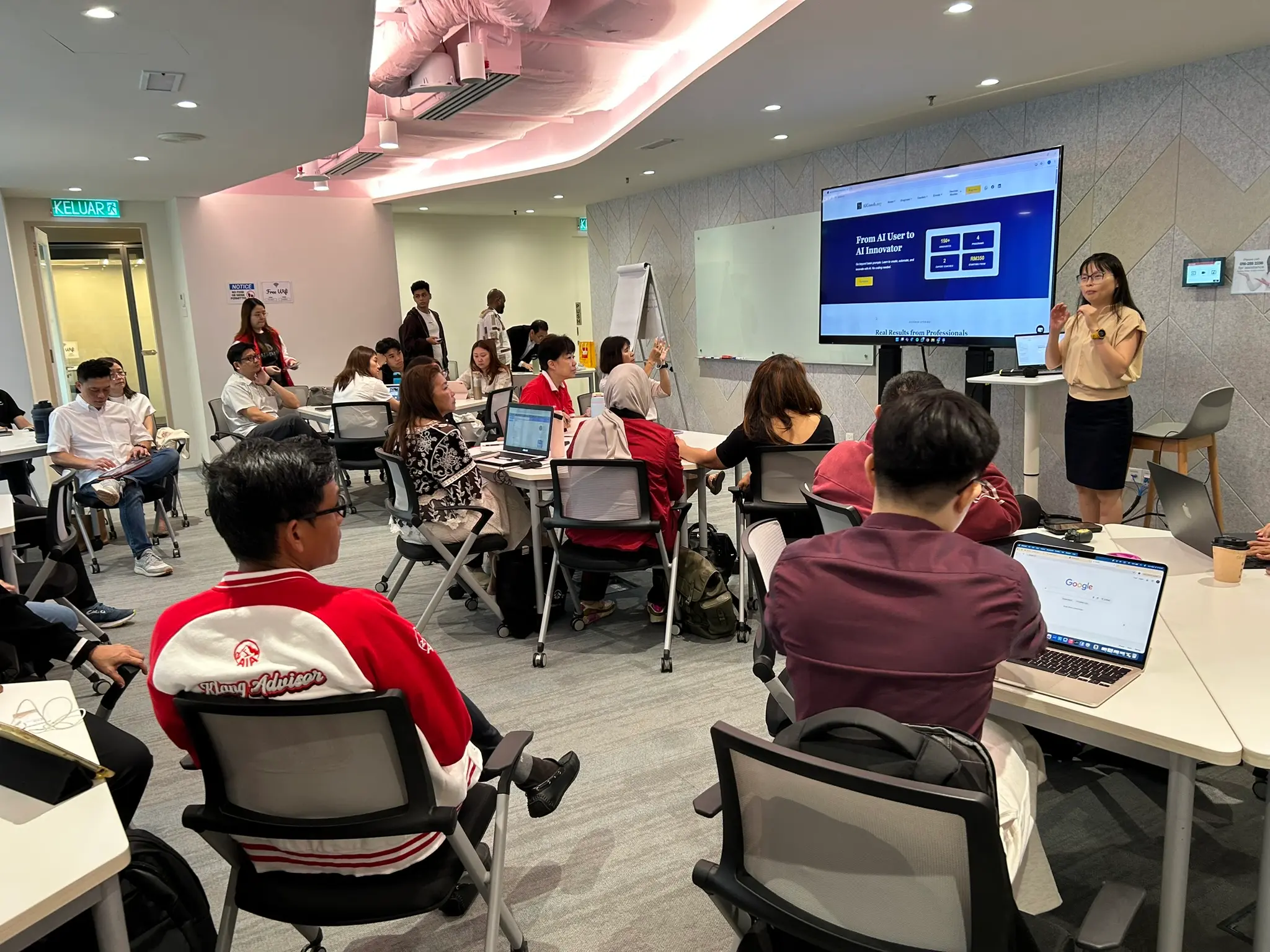 AIA advisors working through the opening AI overview on their laptops in Kuala Lumpur, 18 May 2026