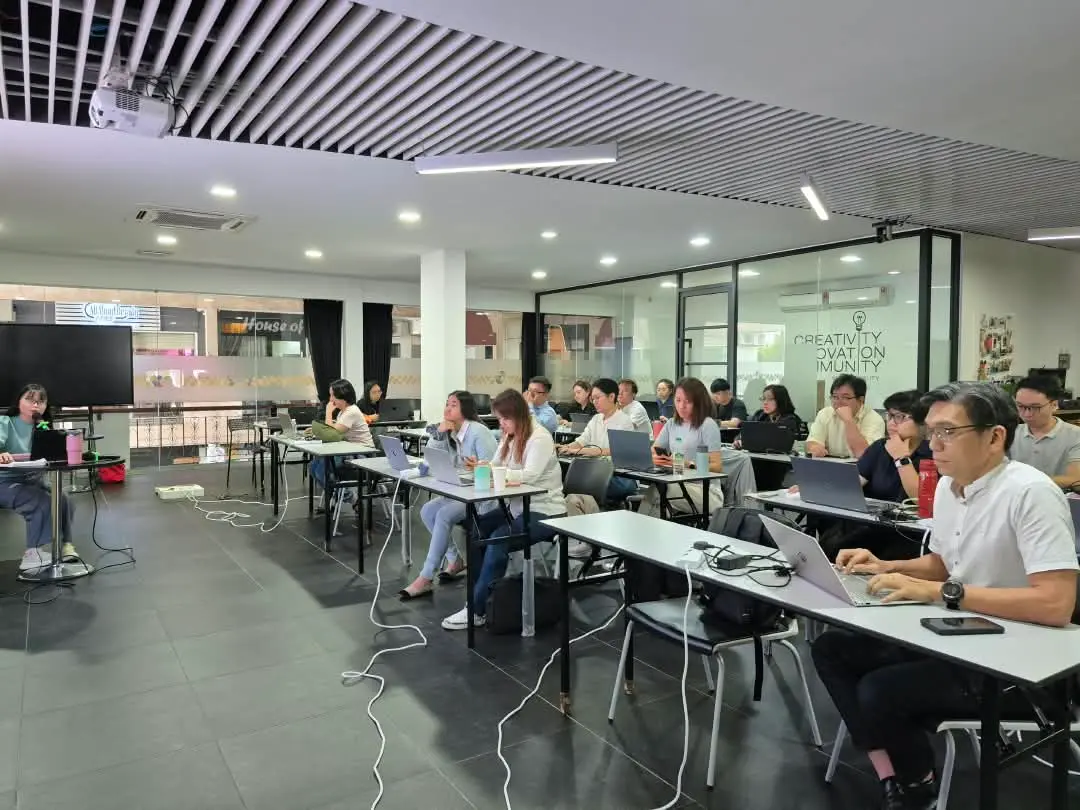 Wide view of the training room at GA Space with rows of participants working on laptops while the trainer speaks from the front, Kota Kinabalu, 30 September 2026