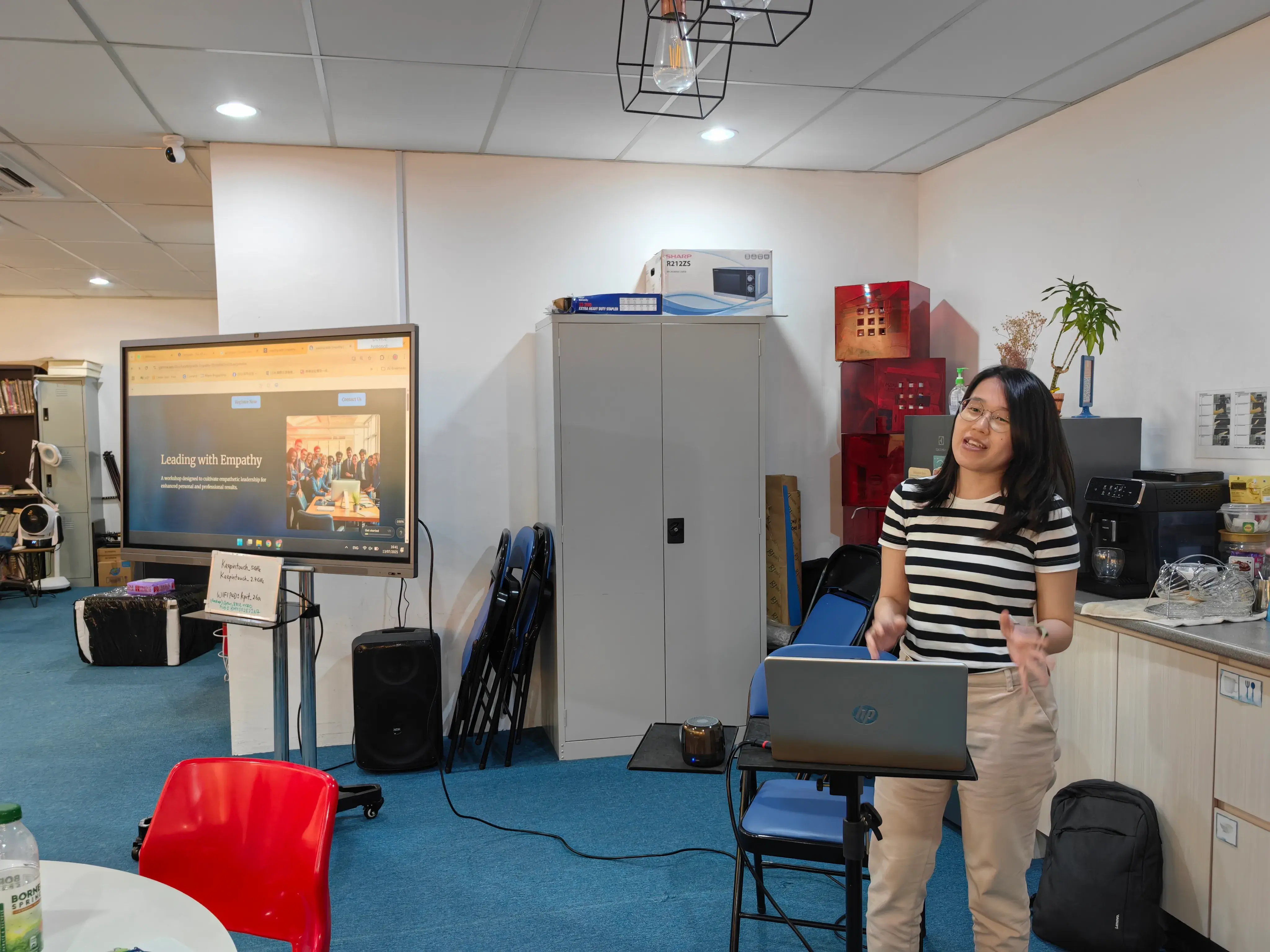 Participant presenting a Leading with Empathy workshop page she built at Inno Day #1