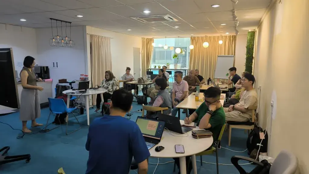 Audience listening attentively to a presentation at Inno Day #4