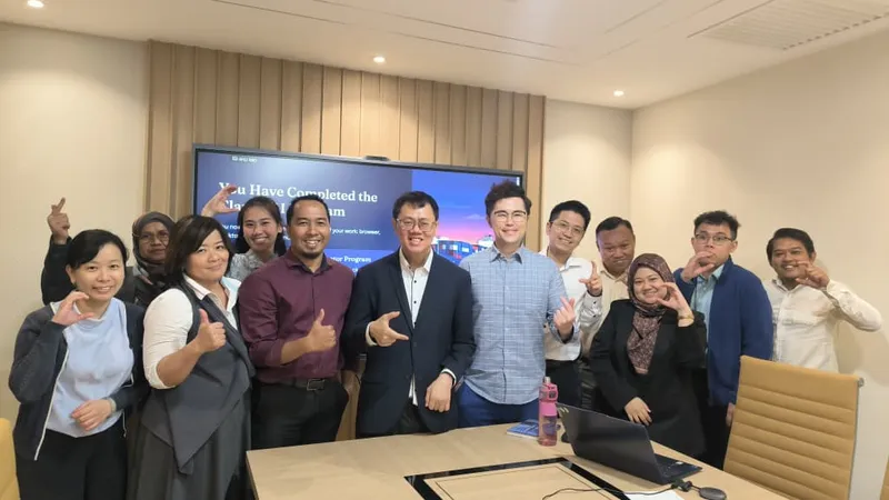 Corporate team posing together after completing the Claude AI training program