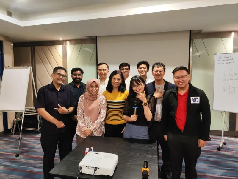 Group photo of public AI training program participants and trainers posing together