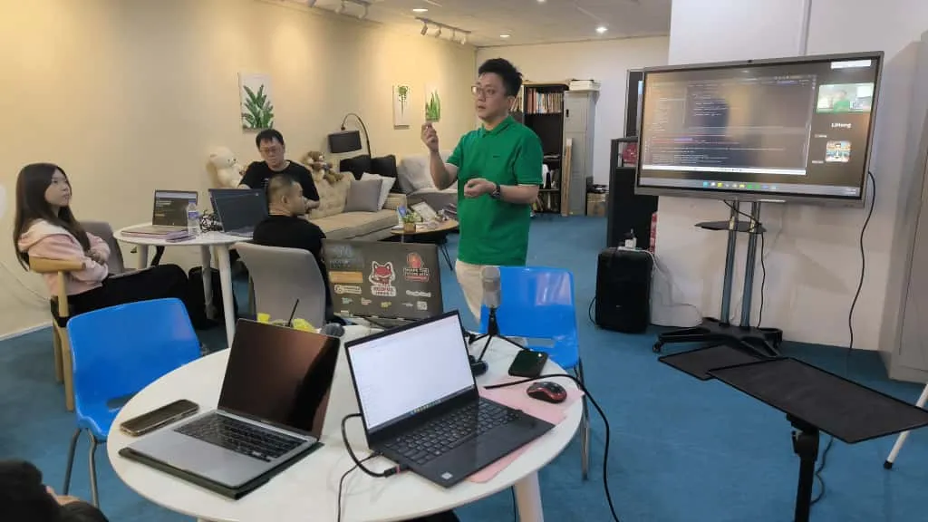 Presenter demonstrating AI tools on screen at Inno Day #2